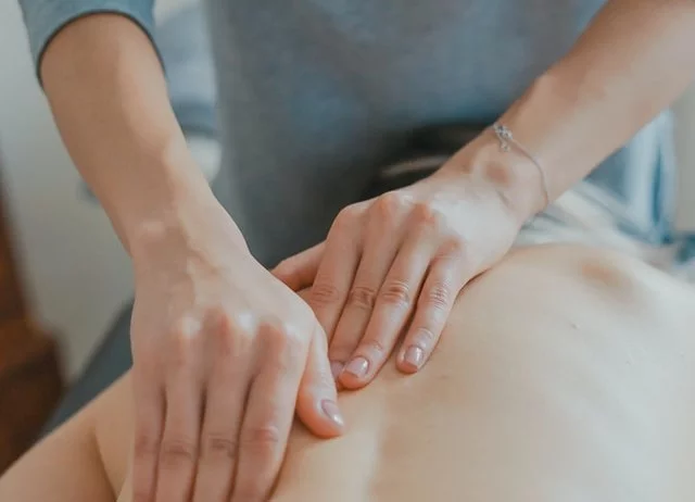 What kind of conditions and injuries does massage therapy treat?